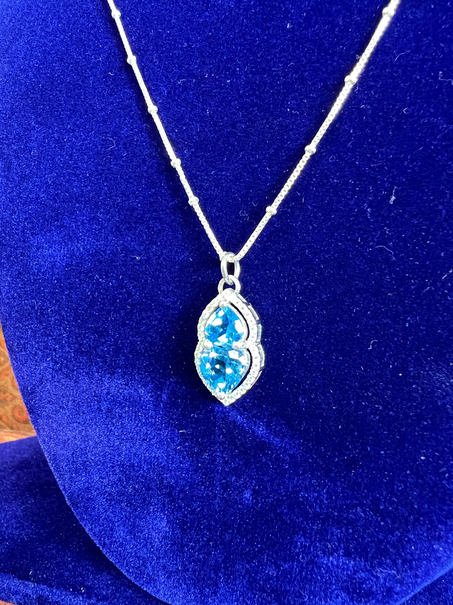 Womens Blue Topaz Heart Pendant 925 Sterling Silver Necklace on a Box Ball Silver Chain Basket Prong framed with Moissanites