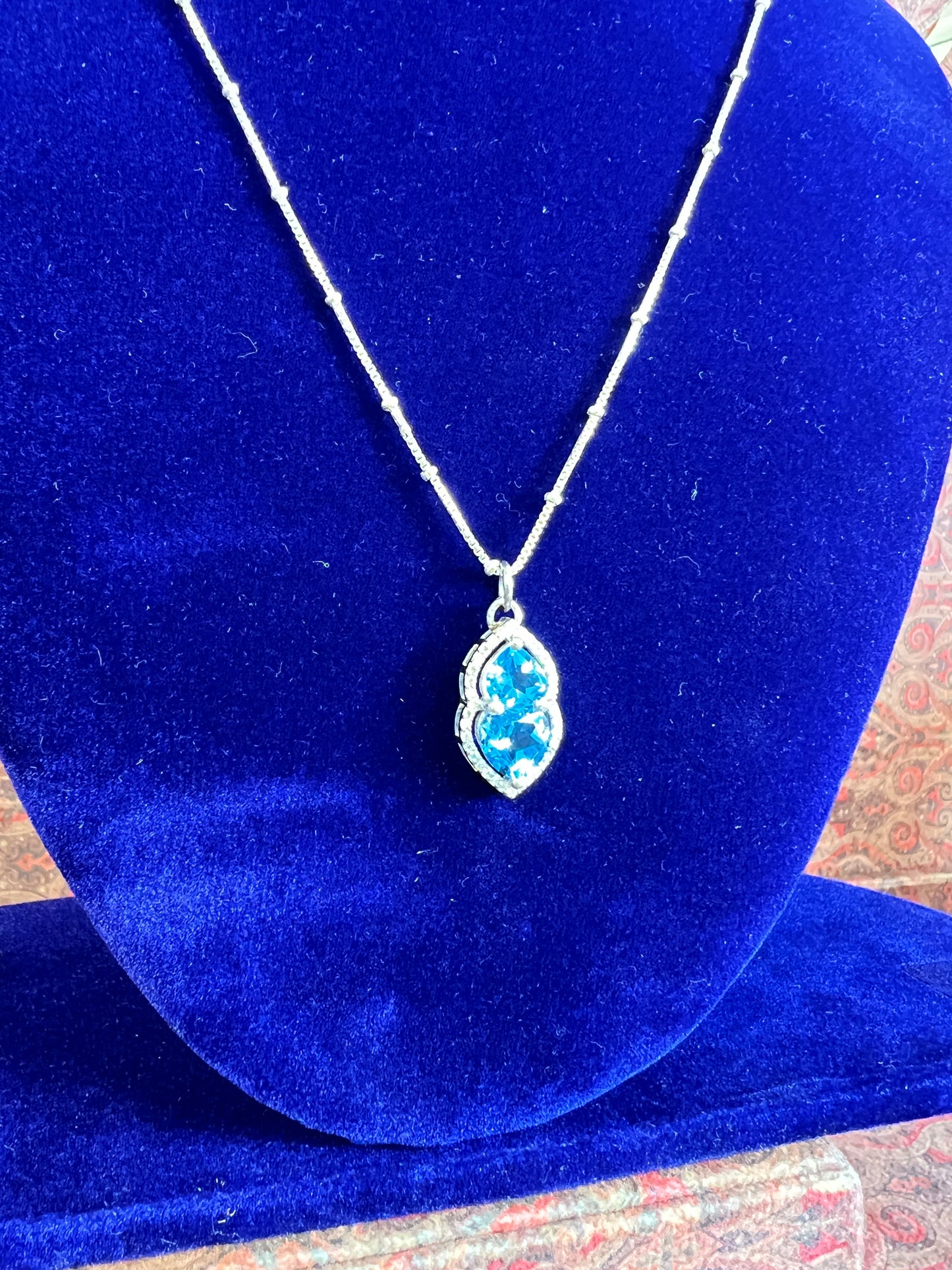 Womens Blue Topaz Heart Pendant 925 Sterling Silver Necklace on a Box Ball Silver Chain Basket Prong framed with Moissanites