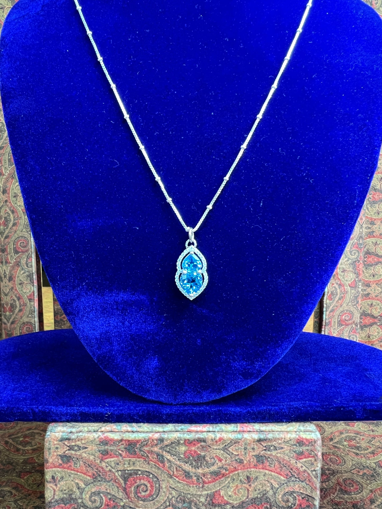 Womens Blue Topaz Heart Pendant 925 Sterling Silver Necklace on a Box Ball Silver Chain Basket Prong framed with Moissanites